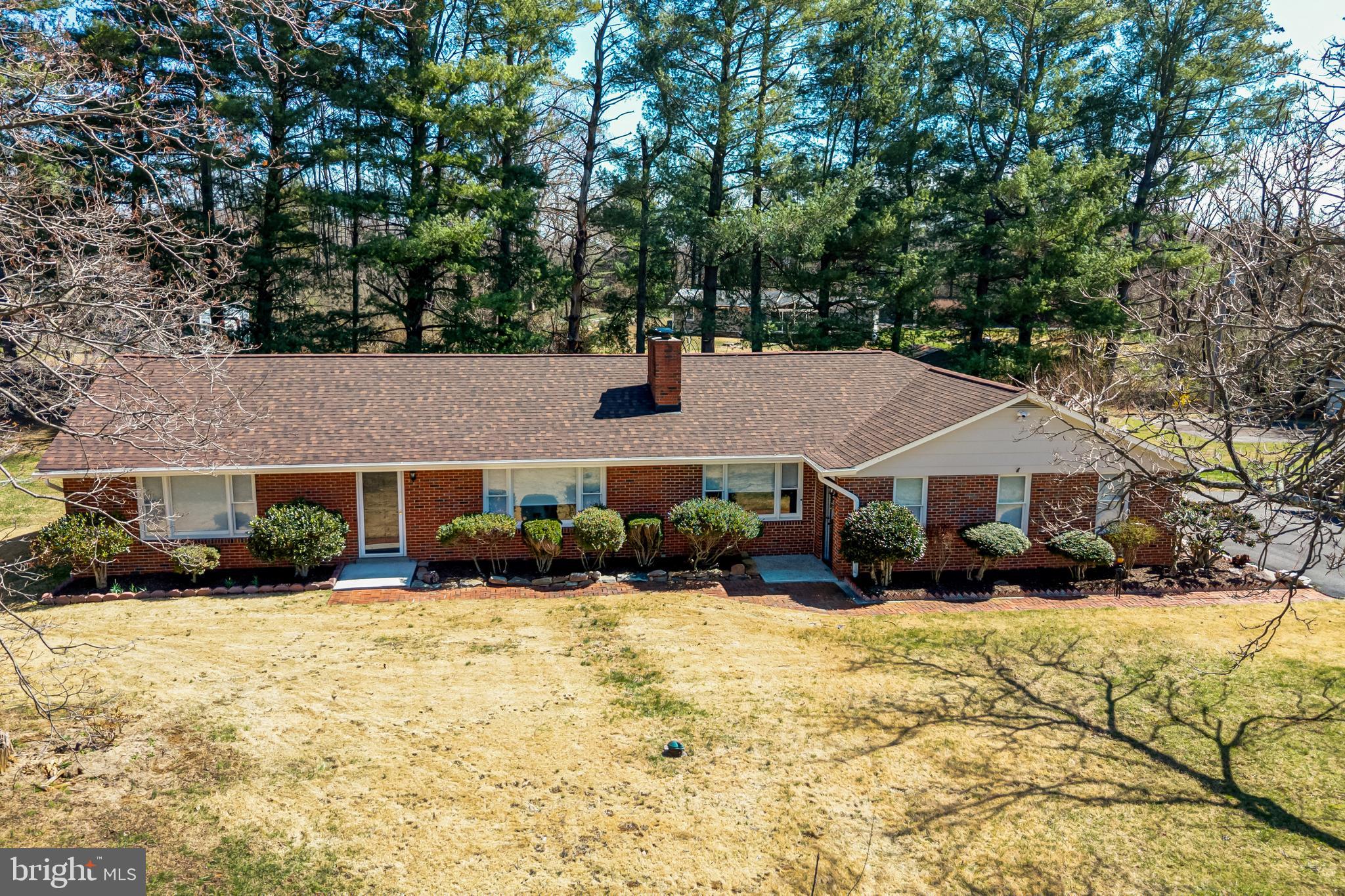 6017 Wheeler Lane Broad Run, VA 20137 - Photo 29 of 45 front view of a house with a yard