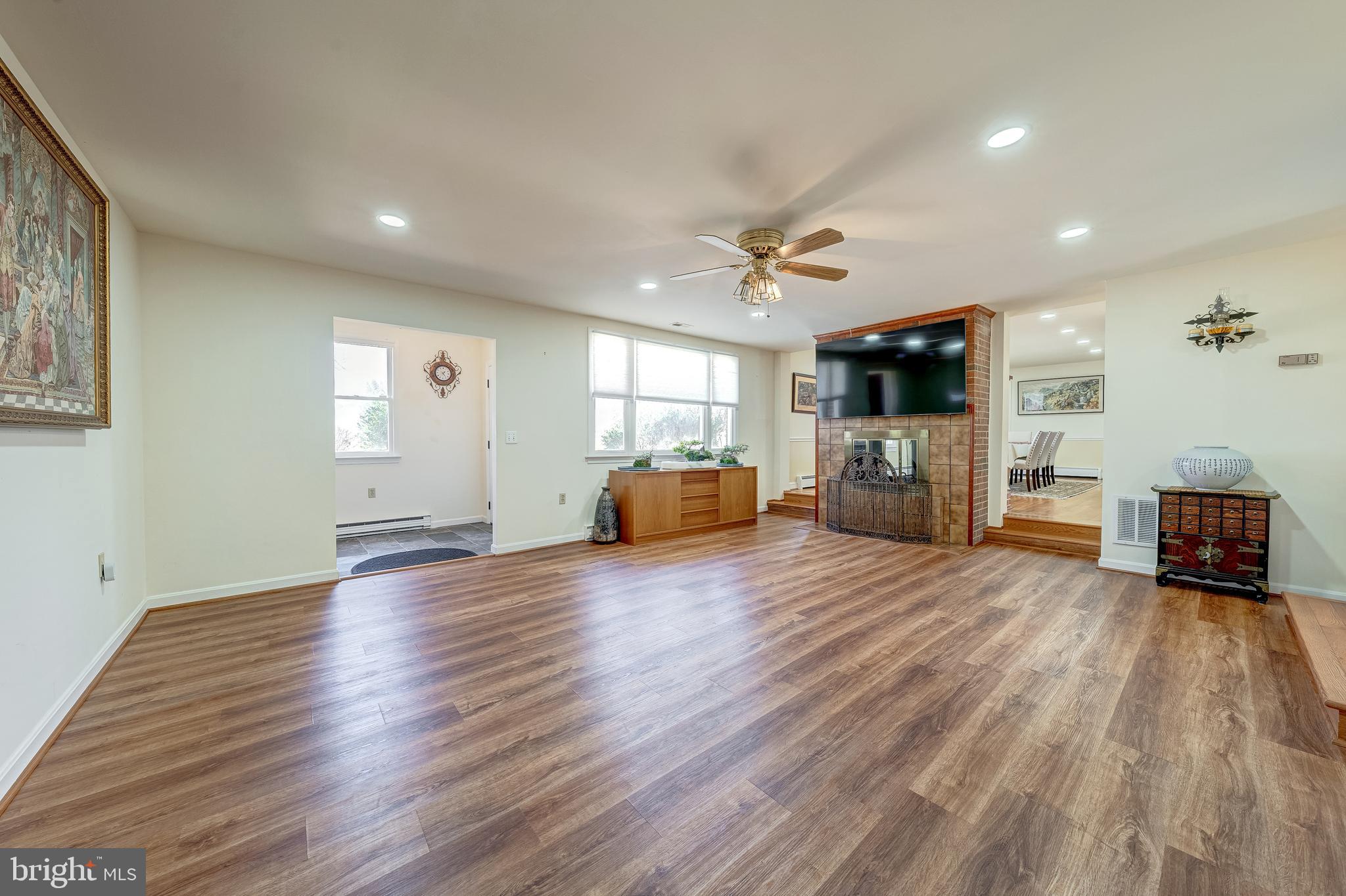 6017 Wheeler Lane Broad Run, VA 20137 - Photo 3 of 45 a living room with furniture and a wooden floor