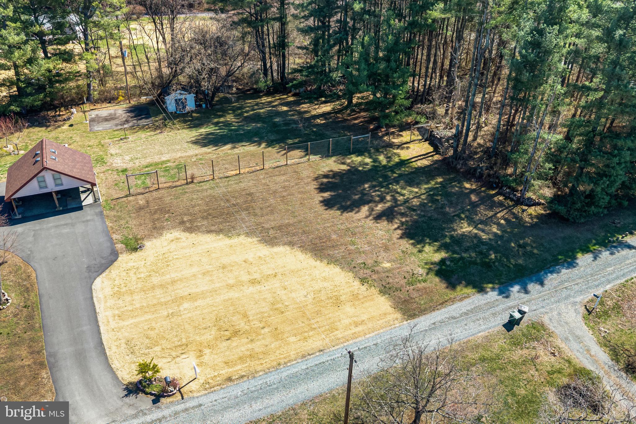 6017 Wheeler Lane Broad Run, VA 20137 - Photo 32 of 45 a view of swimming pool with an outdoor space