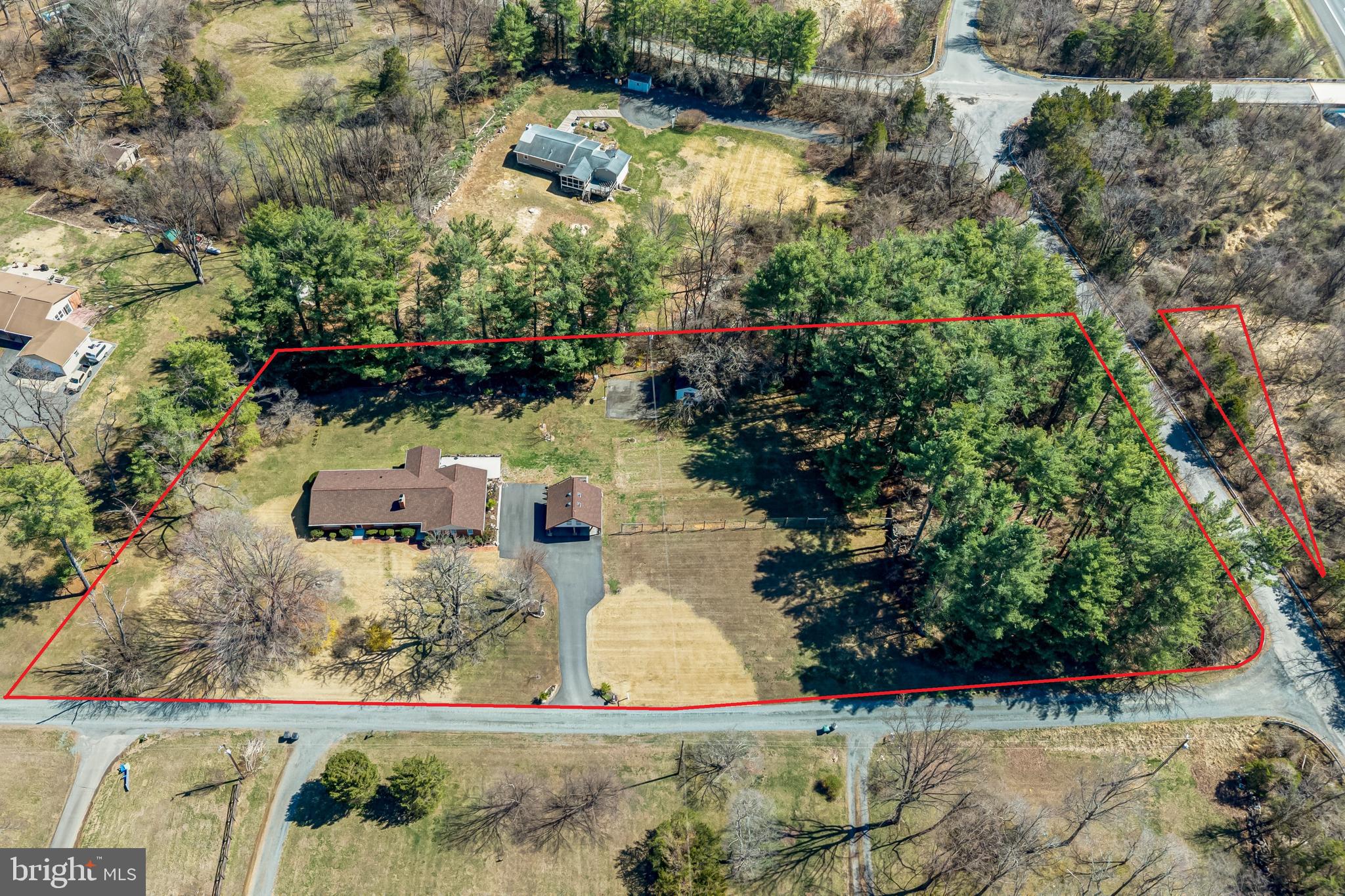 6017 Wheeler Lane Broad Run, VA 20137 - Photo 34 of 45 an aerial view of a house with a yard basket ball court and outdoor seating