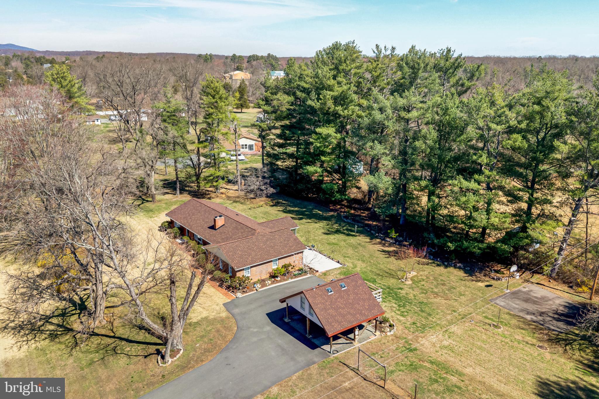 6017 Wheeler Lane Broad Run, VA 20137 - Photo 35 of 45 an aerial view of a house with a yard