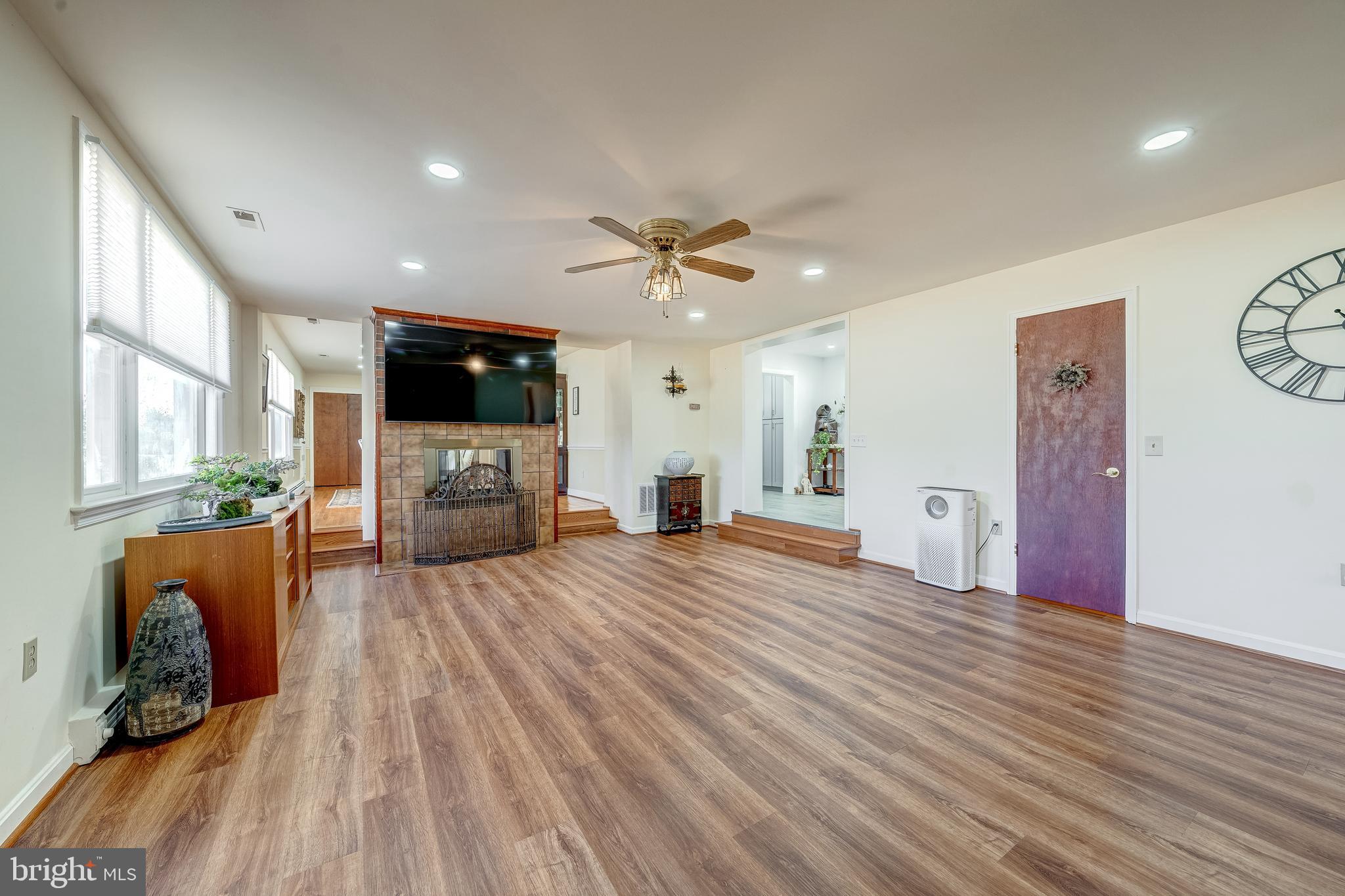 6017 Wheeler Lane Broad Run, VA 20137 - Photo 4 of 45 a living room with furniture and a wooden floor