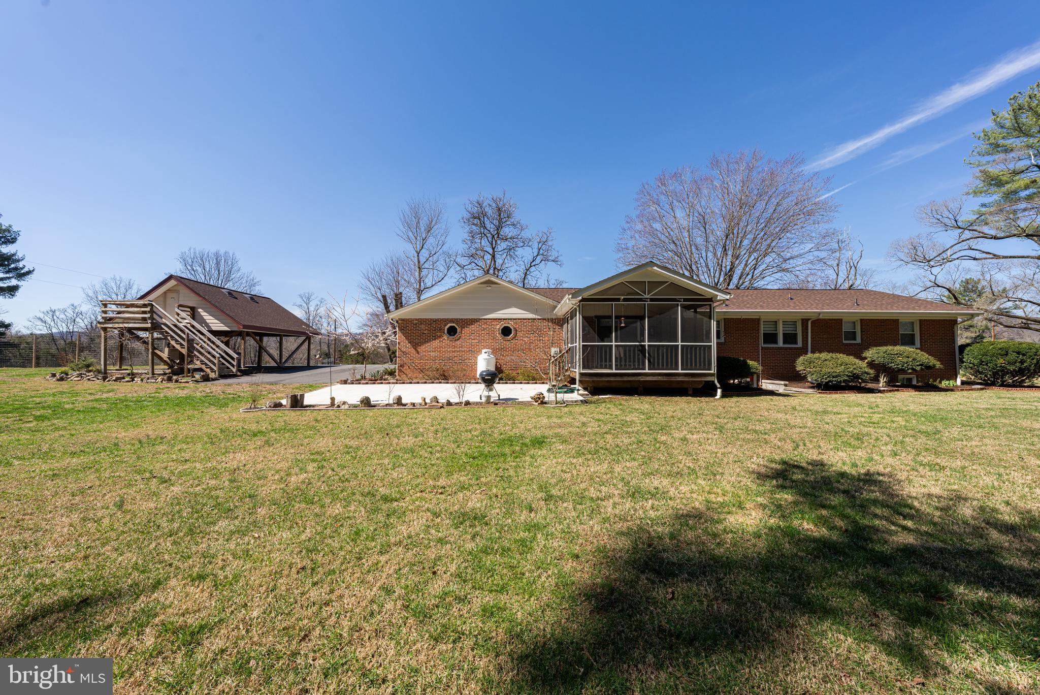 6017 Wheeler Lane Broad Run, VA 20137 - Photo 41 of 45 a front view of a house with a yard