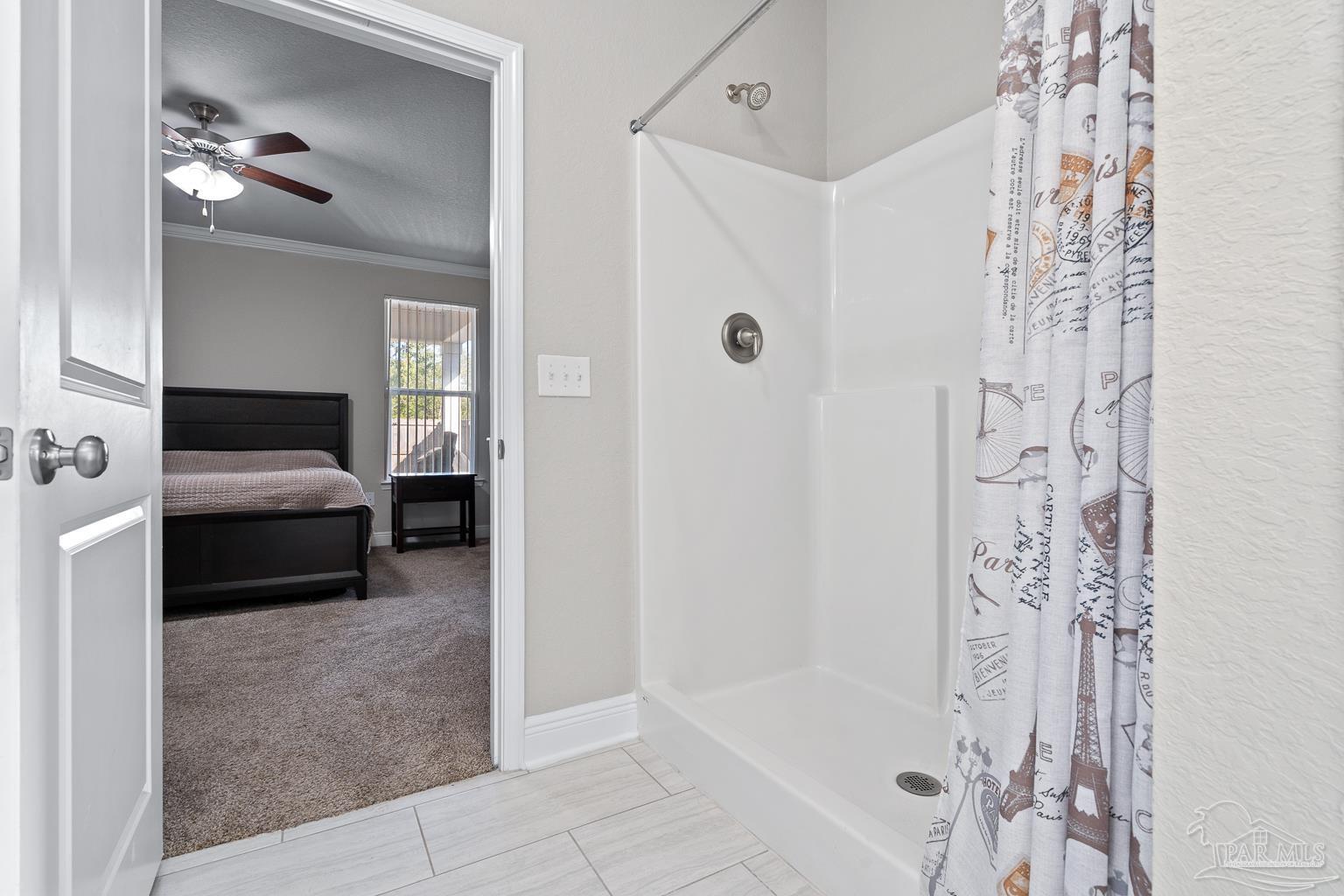 3838 Ranch Road Pace, FL 32571 - Photo 25 of 40 a en suite spacious bathroom with a shower and a tub