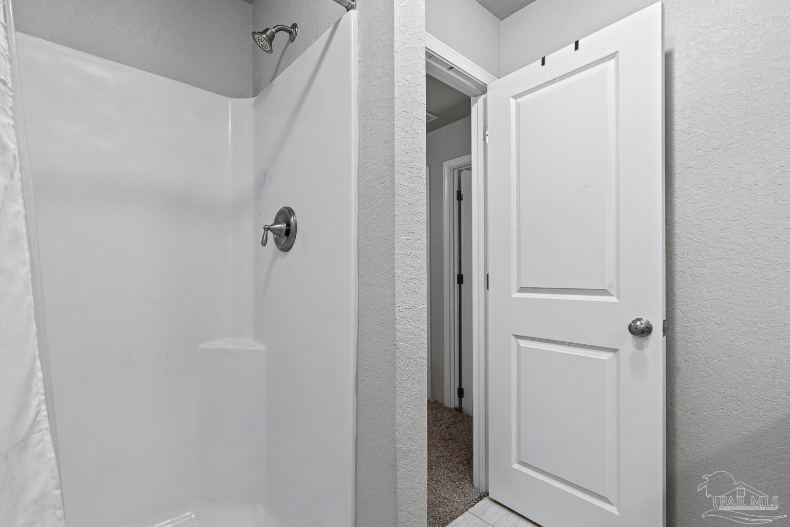 3838 Ranch Road Pace, FL 32571 - Photo 34 of 40 a bathroom with a shower