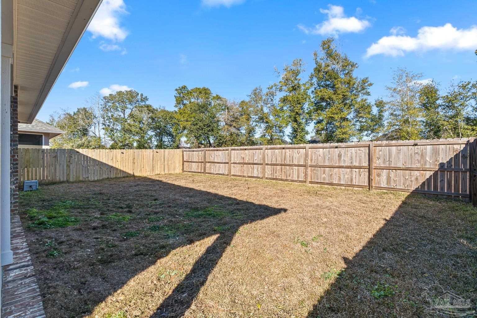 3838 Ranch Road Pace, FL 32571 - Photo 37 of 42 a view of a backyard