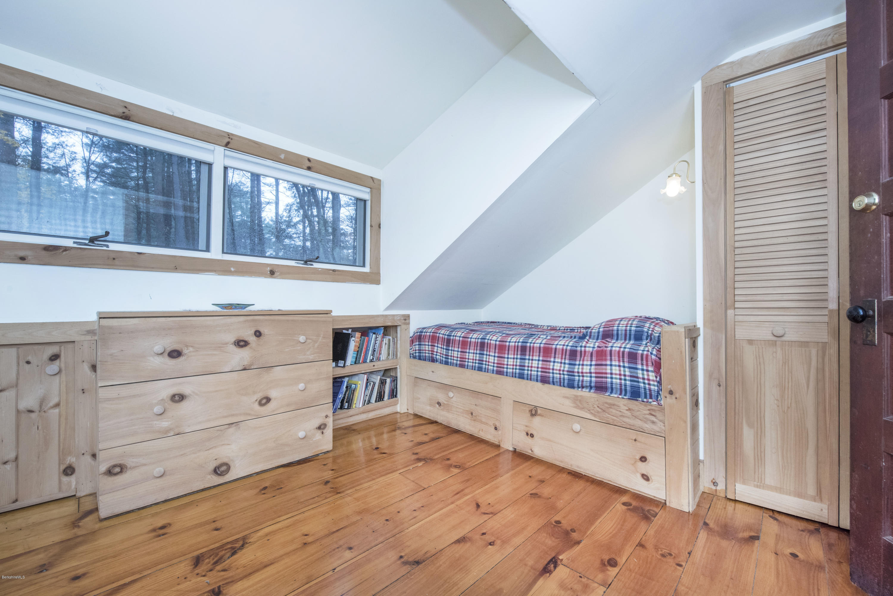 16 Bidwell Road Monterey, MA 01245 - Photo 22 of 40 a bedroom with a bed and a dresser