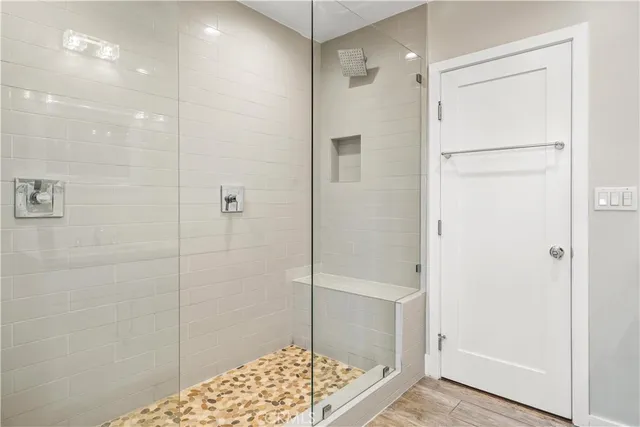 a view of room with window and hardwood floor