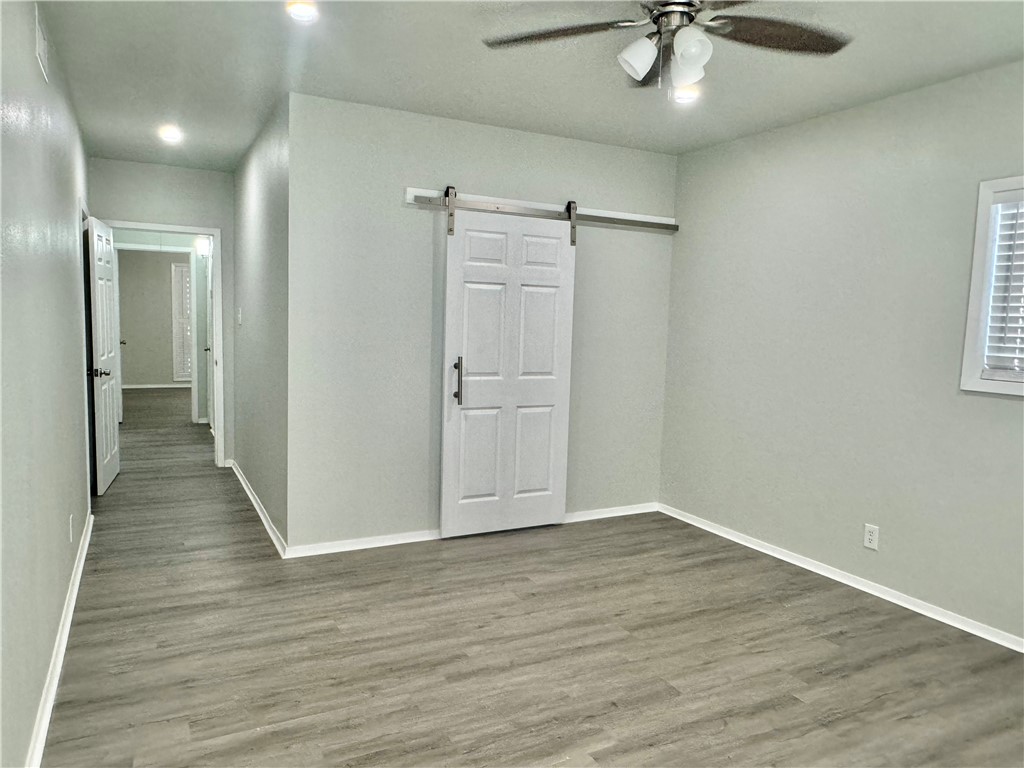 1805 3rd Street Corpus Christi, TX 78404 - Photo 17 of 26 a view of a hallway with wooden floor