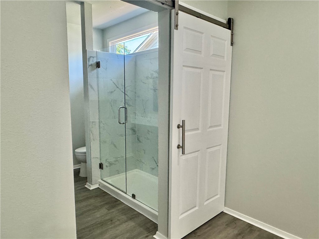 1805 3rd Street Corpus Christi, TX 78404 - Photo 18 of 26 a bathroom with a shower and a sink
