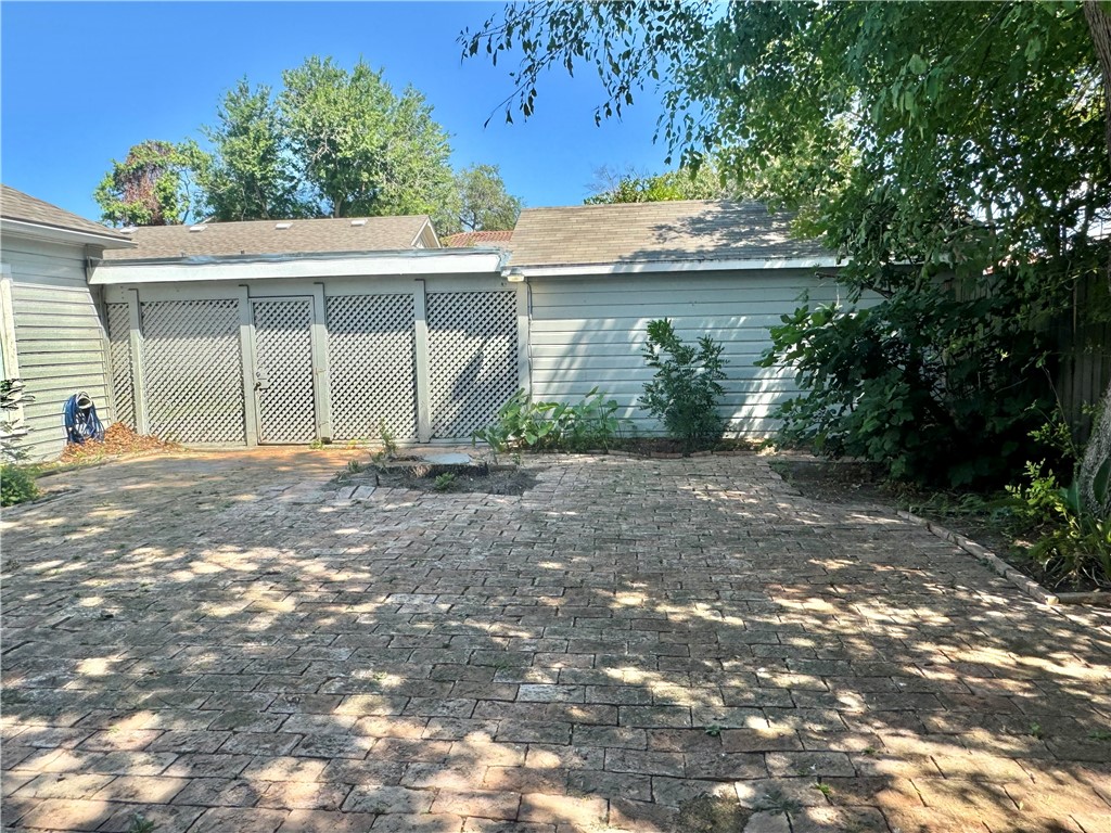 1805 3rd Street Corpus Christi, TX 78404 - Photo 25 of 26 a view of a house with a yard
