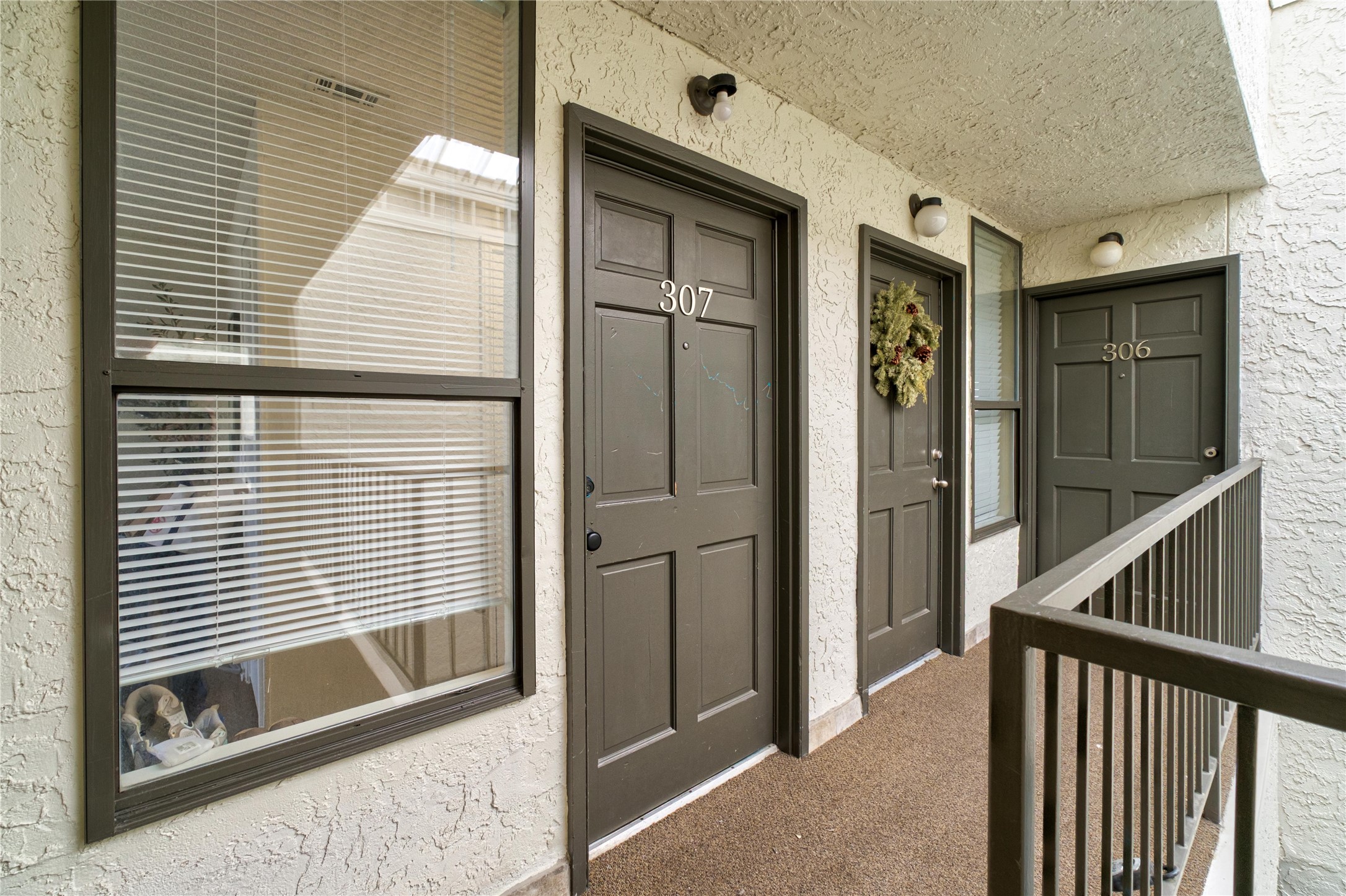 2409 Leon Street, Unit 307 Austin, TX 78705 - Photo 23 of 23 a view of a front door and a window