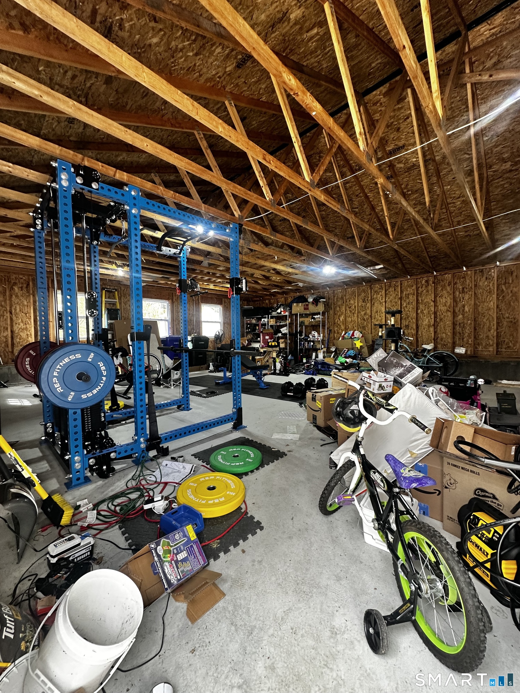 67 Deerfield Ridge Drive Groton, CT 06355 - Photo 31 of 35 a view of a room with gym equipment