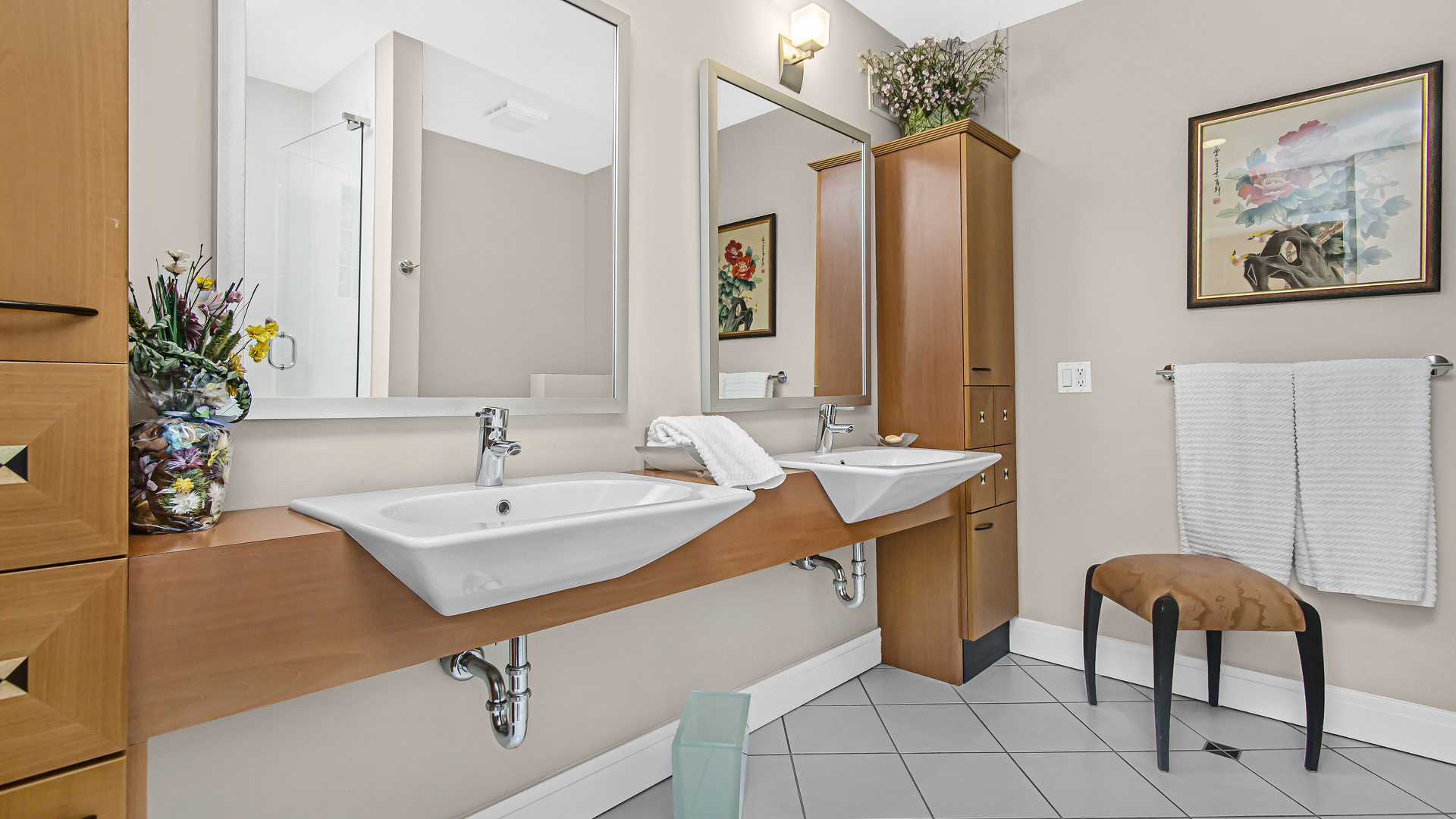 1182 Mayfair Lane Glencoe, IL 60022 - Photo 23 of 28 a bathroom with a sink a table and a mirror