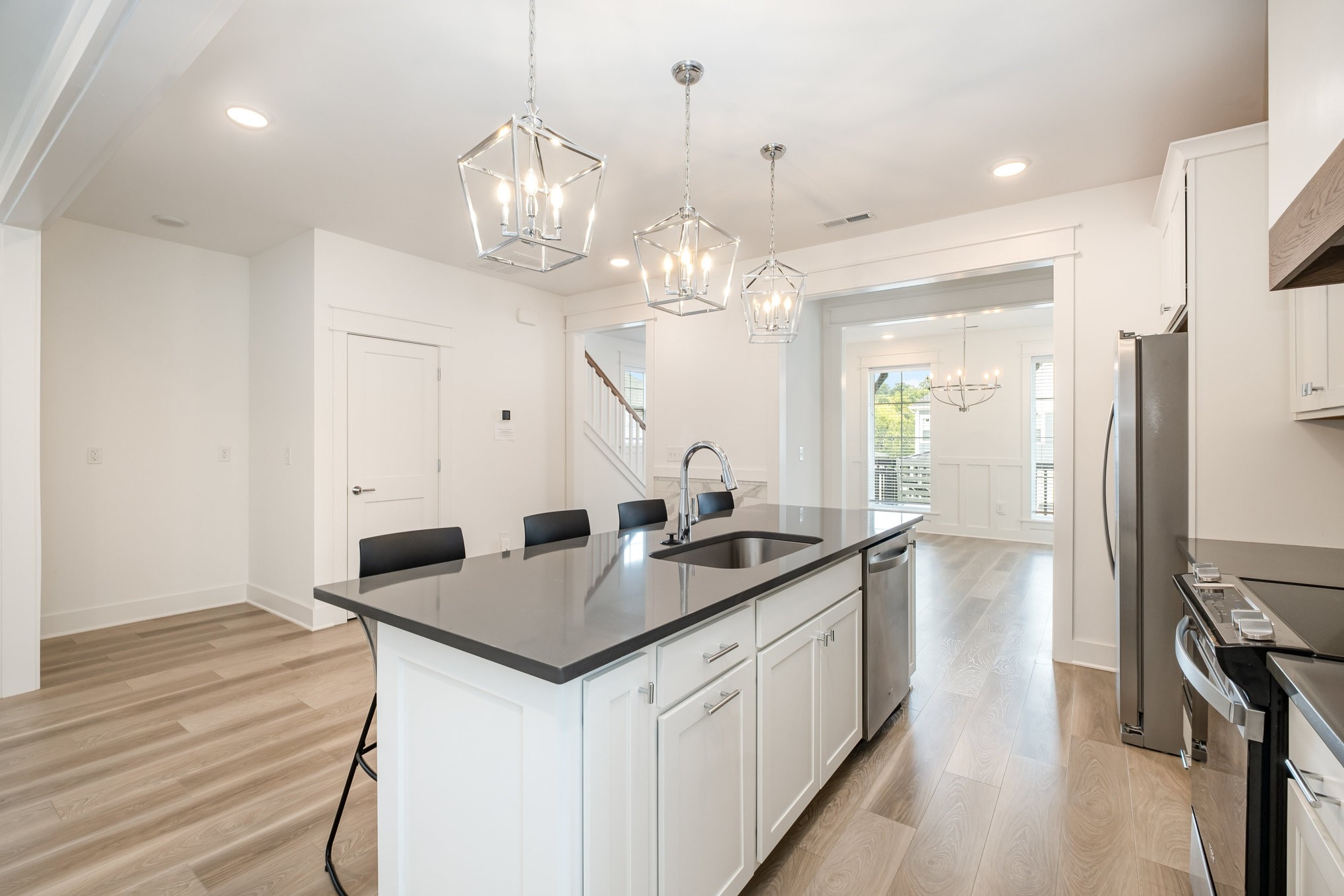 226 Sounder Circle La Vergne, TN 37086 - Photo 6 of 7 a kitchen with granite countertop a sink cabinets and stainless steel appliances