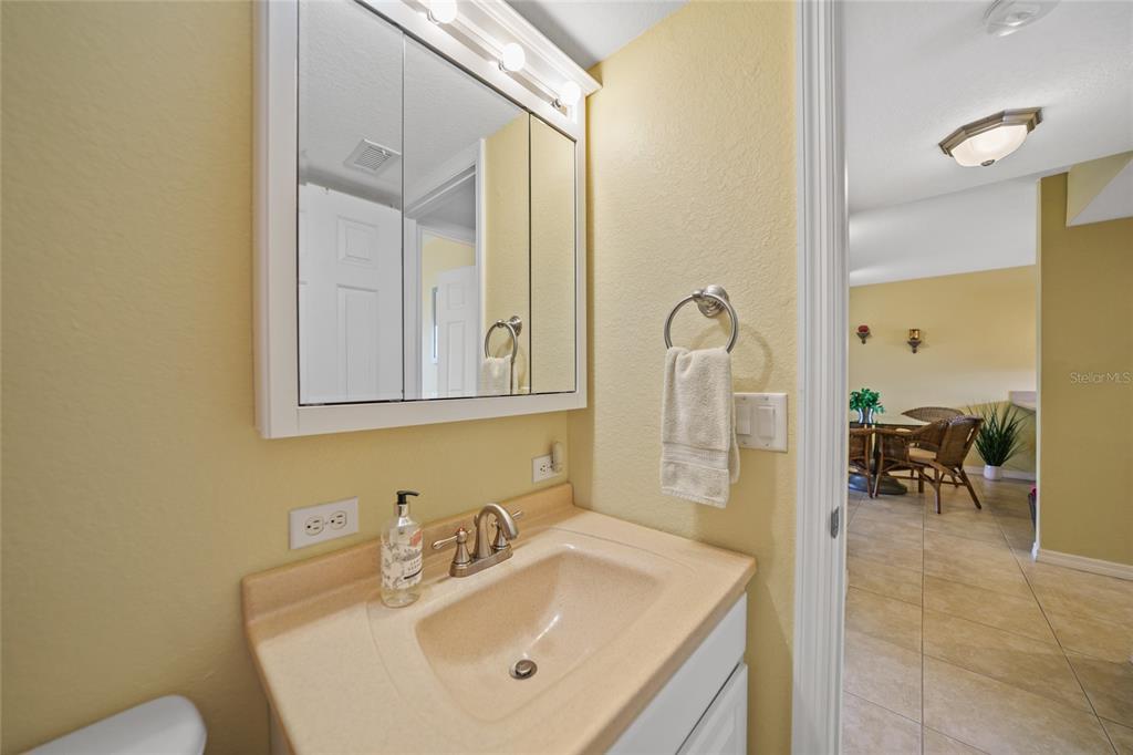 175 Kings Highway, Unit 226 Punta Gorda, FL 33983 - Photo 17 of 41 a bathroom with a sink and a mirror