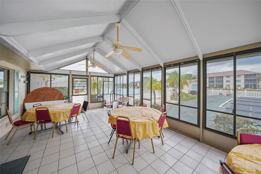 175 Kings Highway, Unit 226 Punta Gorda, FL 33983 - Photo 30 of 41 a living room with furniture and a large window