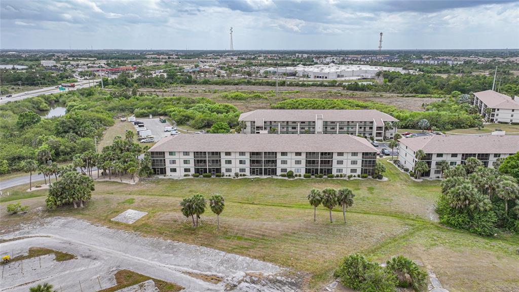 175 Kings Highway, Unit 226 Punta Gorda, FL 33983 - Photo 36 of 41 an aerial view of a house with a yard