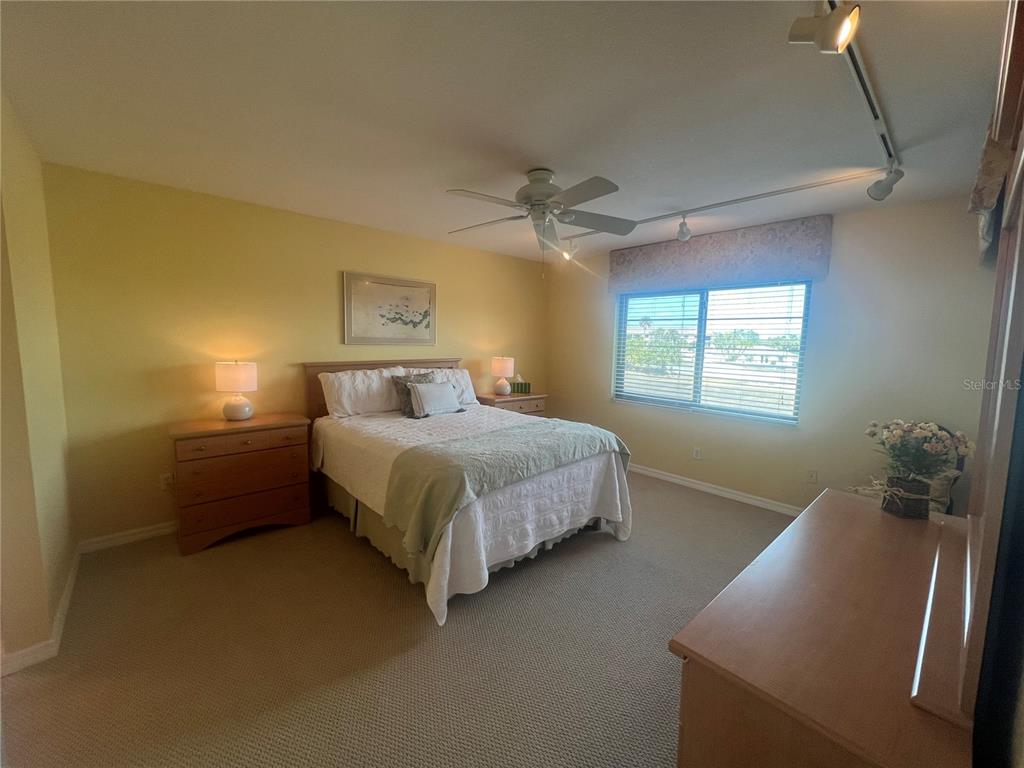 175 Kings Highway, Unit 226 Punta Gorda, FL 33983 - Photo 37 of 41 a bedroom with a bed and a window