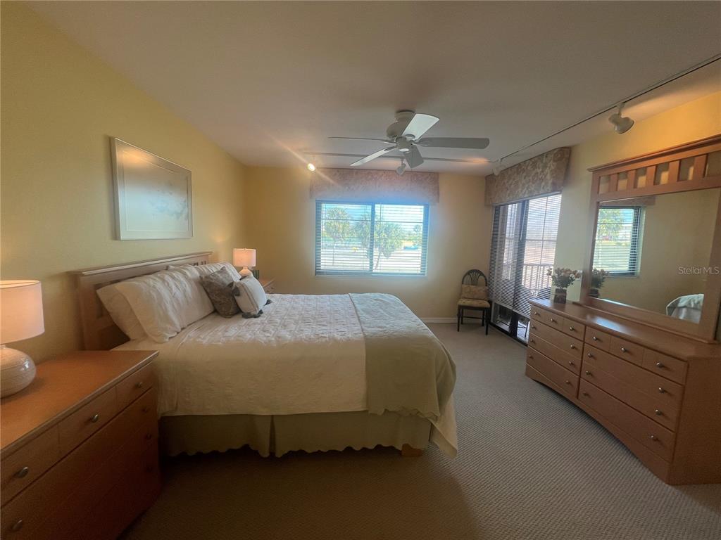 175 Kings Highway, Unit 226 Punta Gorda, FL 33983 - Photo 38 of 41 a bed room with a bed and a furniture