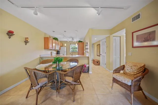 a view of a dining room with furniture