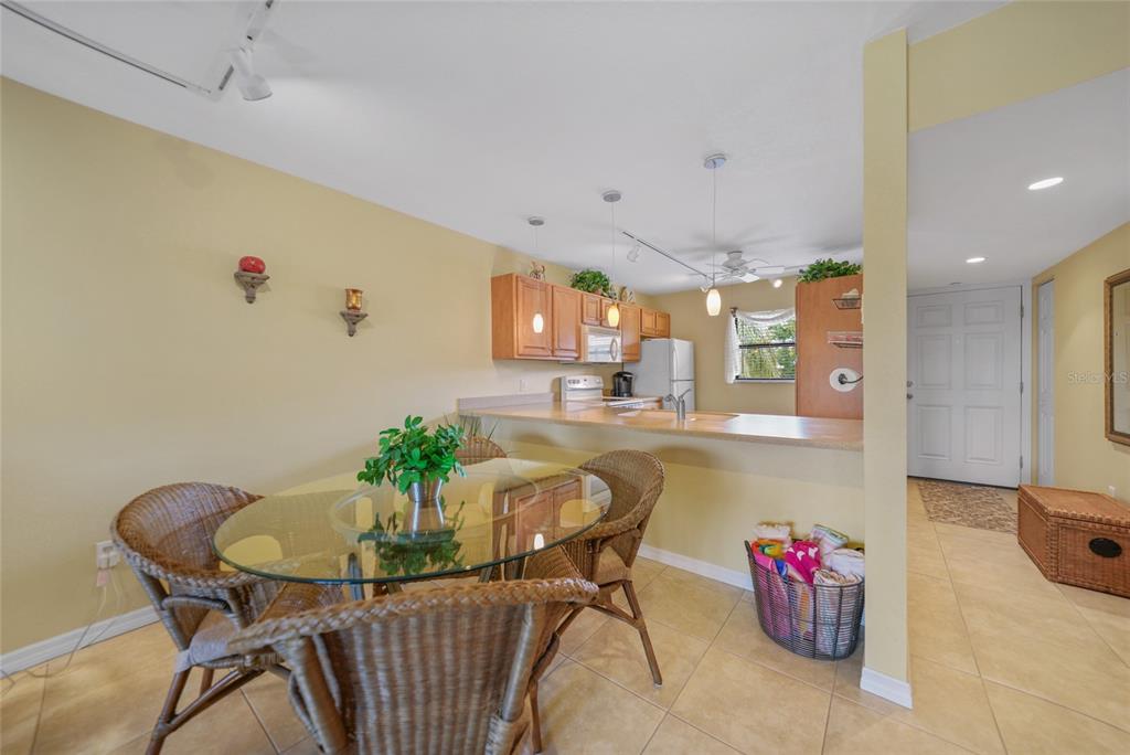 175 Kings Highway, Unit 226 Punta Gorda, FL 33983 - Photo 5 of 41 a view of a dining room with furniture