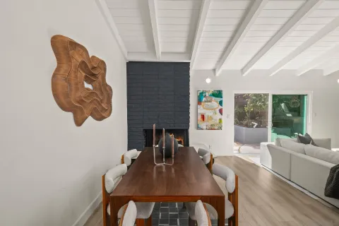 a view of a dining room with furniture window and outside view