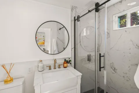 a bathroom with a sink and a mirror