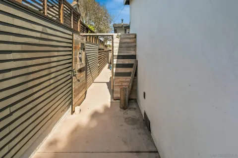 a view of a backyard with sitting area