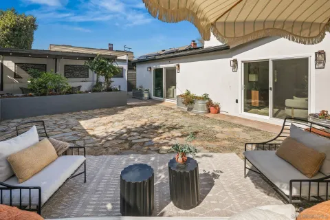 a backyard of a house with yard and garage