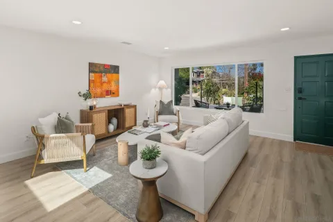 a living room with furniture and a gate