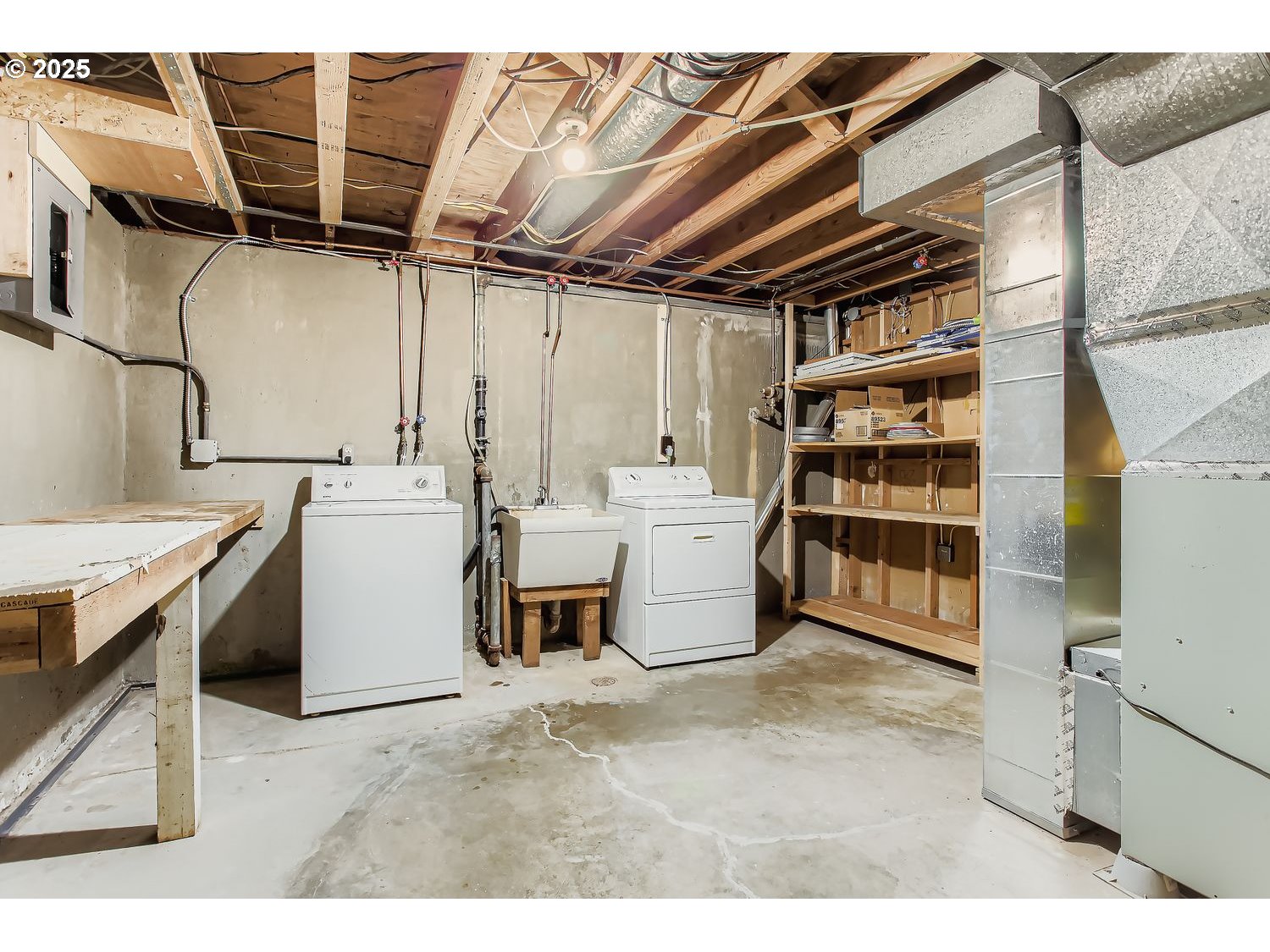 6405 Southwest Radcliff Street Portland, OR 97219 - Photo 21 of 26 a utility room with dryer and washer