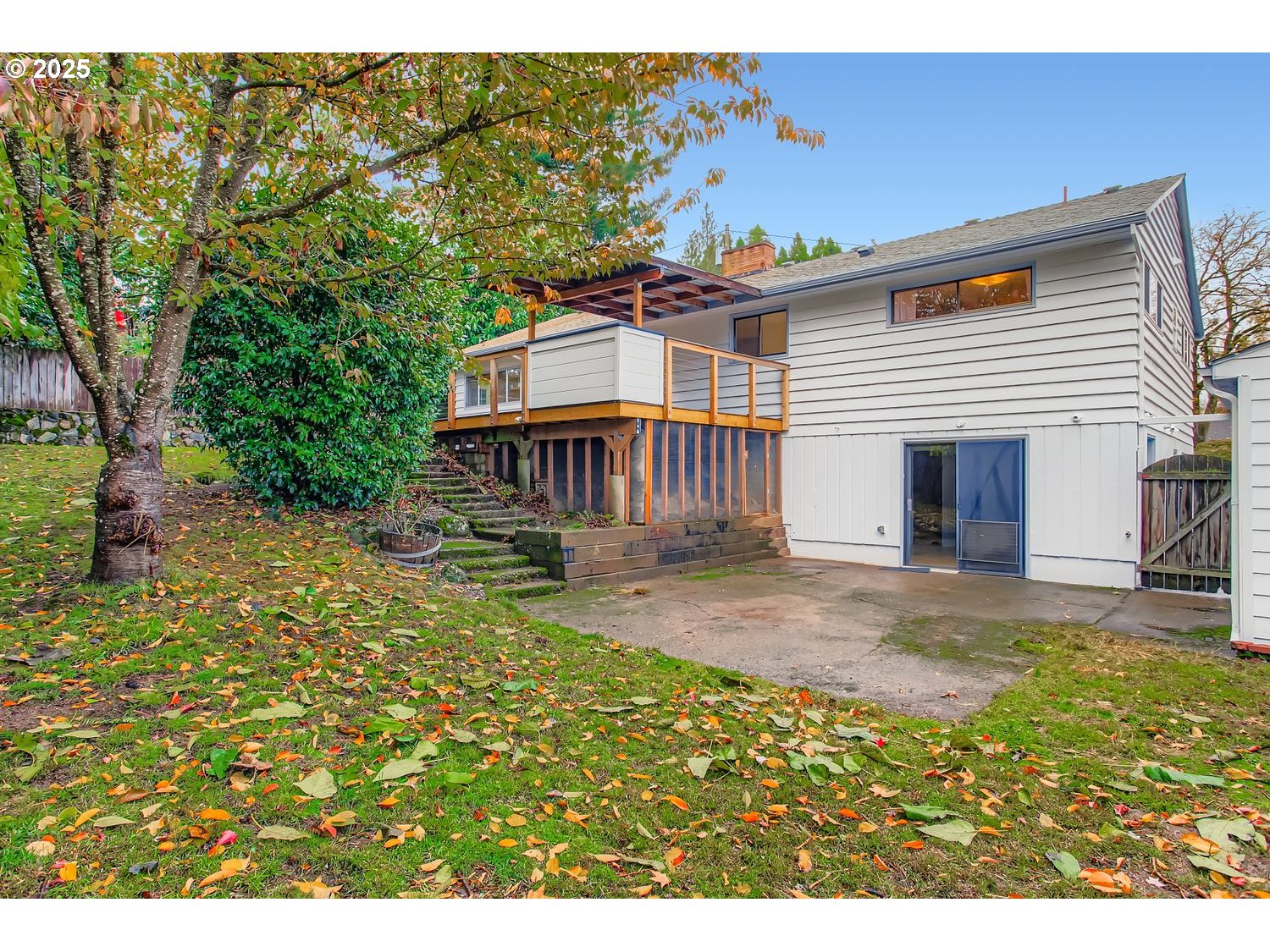 6405 Southwest Radcliff Street Portland, OR 97219 - Photo 26 of 26 a view of a house with a yard