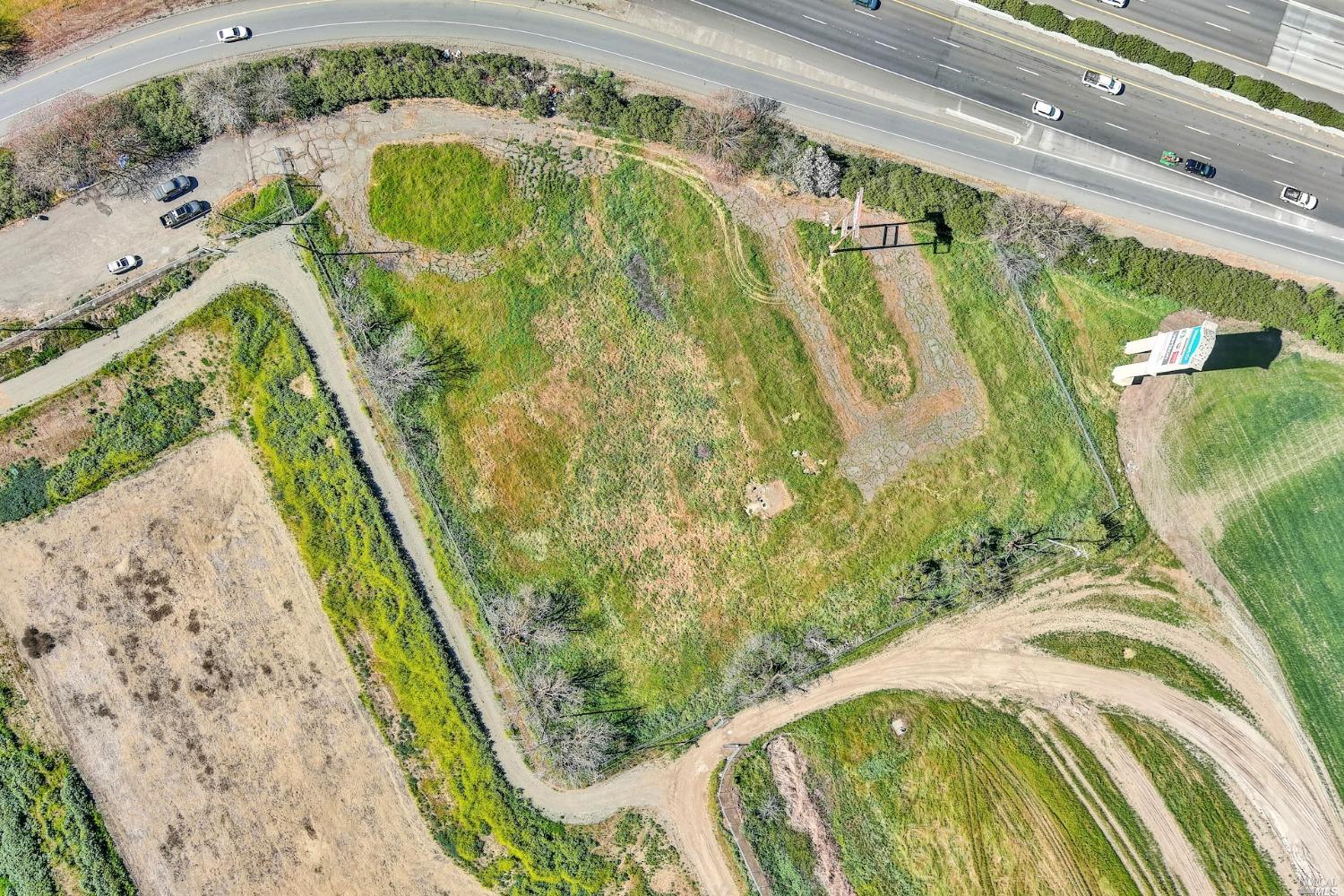 8362 Auction Lane Dixon, CA 95620 - Photo 11 of 15 a view of a swimming pool with a garden