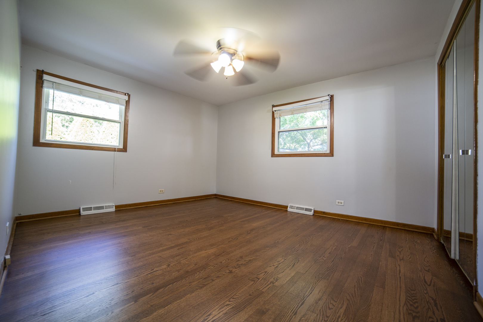 1222 Hickory Road Homewood, IL 60430 - Photo 15 of 29 a view of an empty room window and wooden floor