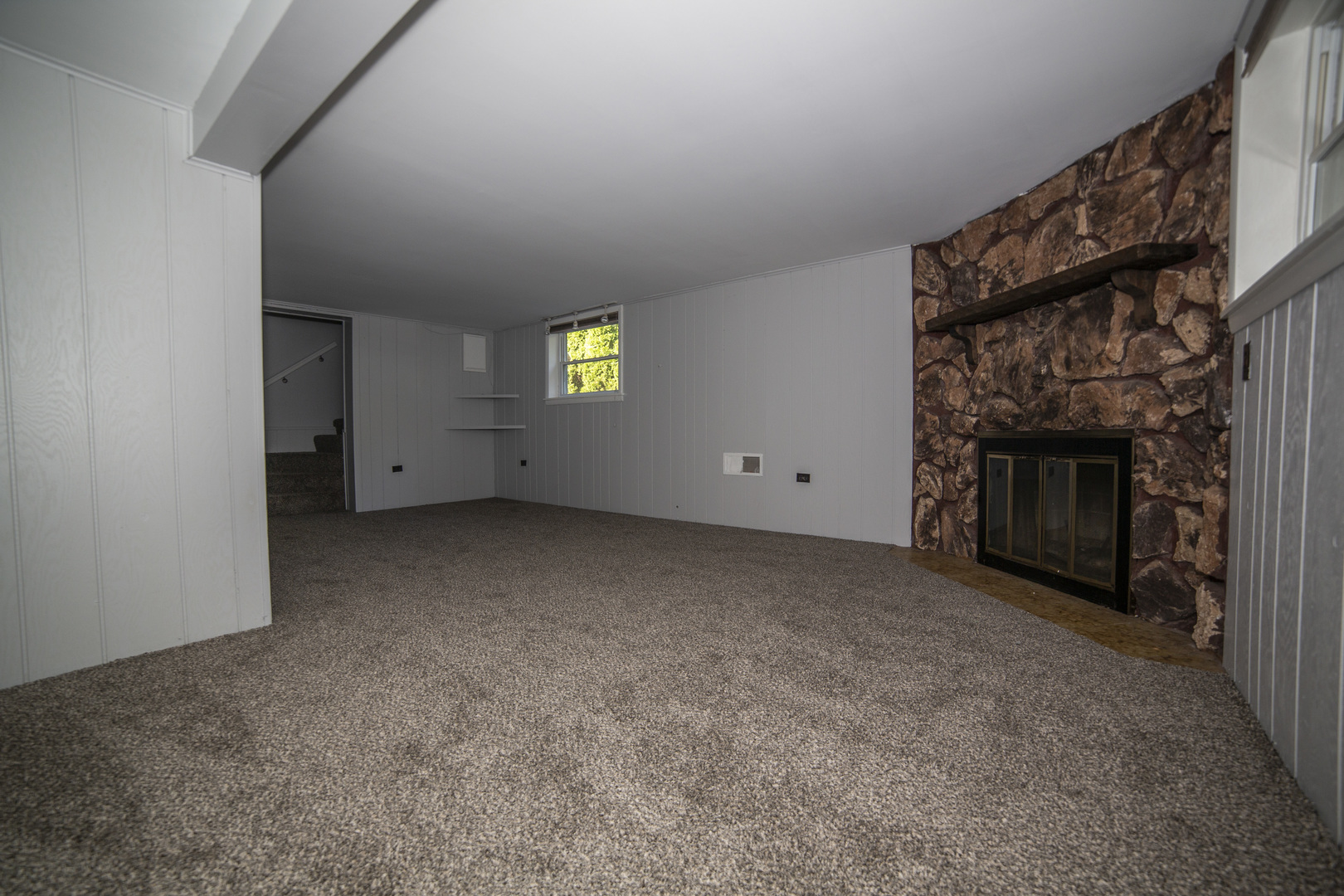 1222 Hickory Road Homewood, IL 60430 - Photo 20 of 29 an empty room with windows and fireplace