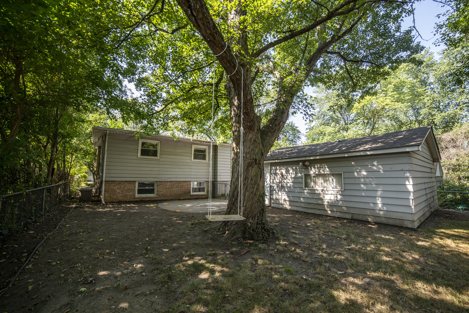 1222 Hickory Road Homewood, IL 60430 - Photo 26 of 29 a view of a house with a yard