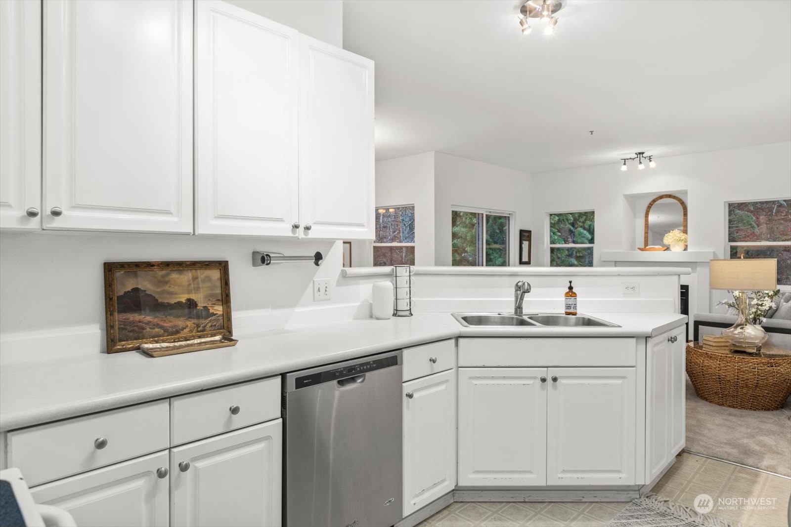 17757 134th Lane Southeast Renton, WA 98058 - Photo 15 of 38 a kitchen with a sink and cabinets