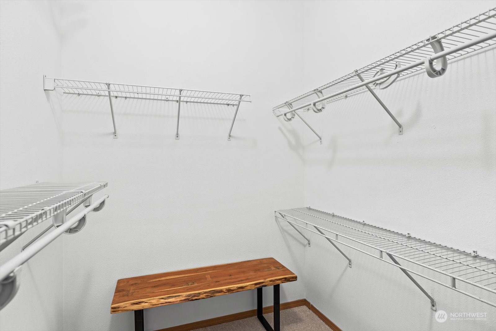 17757 134th Lane Southeast Renton, WA 98058 - Photo 25 of 38 a view of a room with racks on the wall