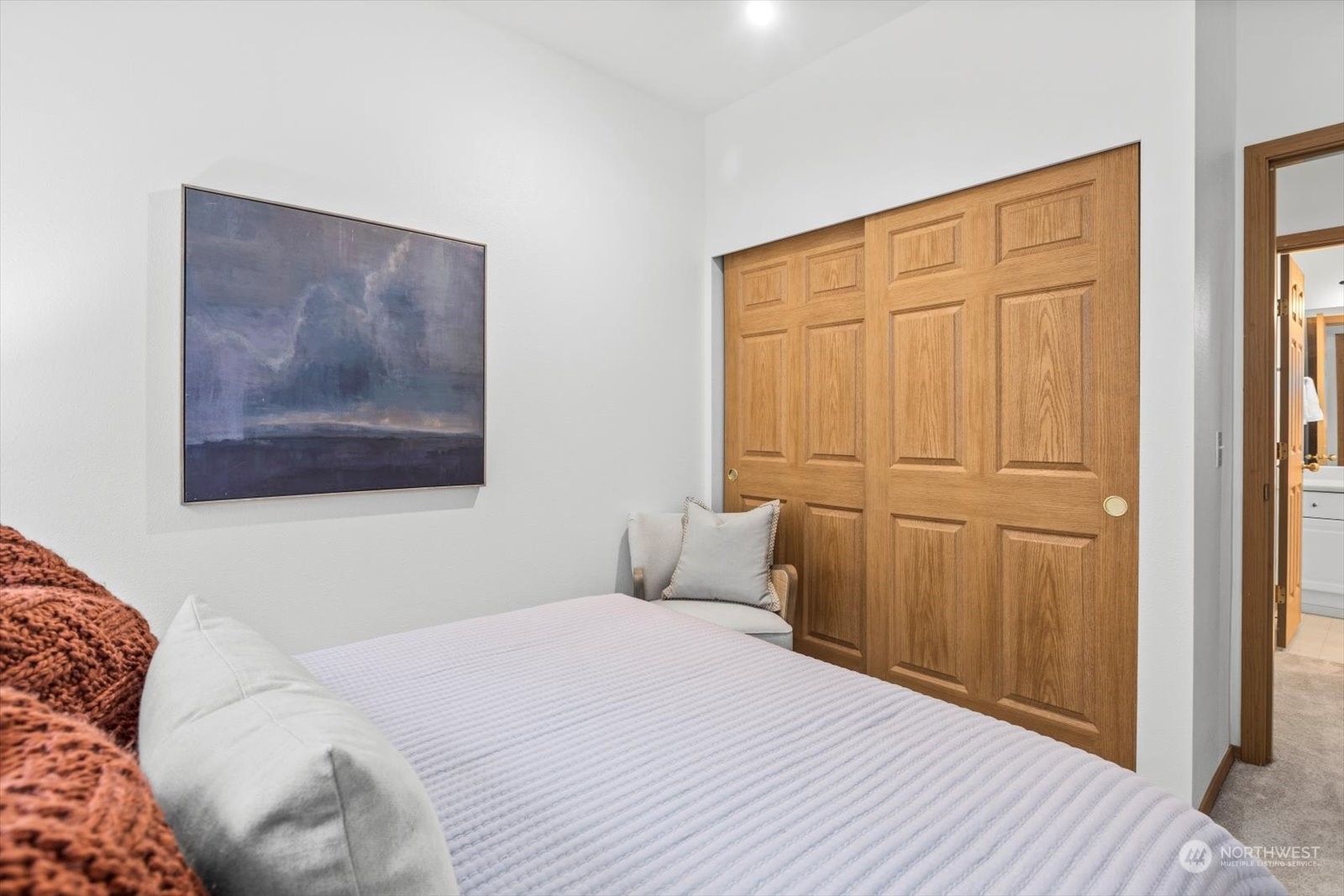 17757 134th Lane Southeast Renton, WA 98058 - Photo 27 of 38 a bedroom with a bed and wooden floor