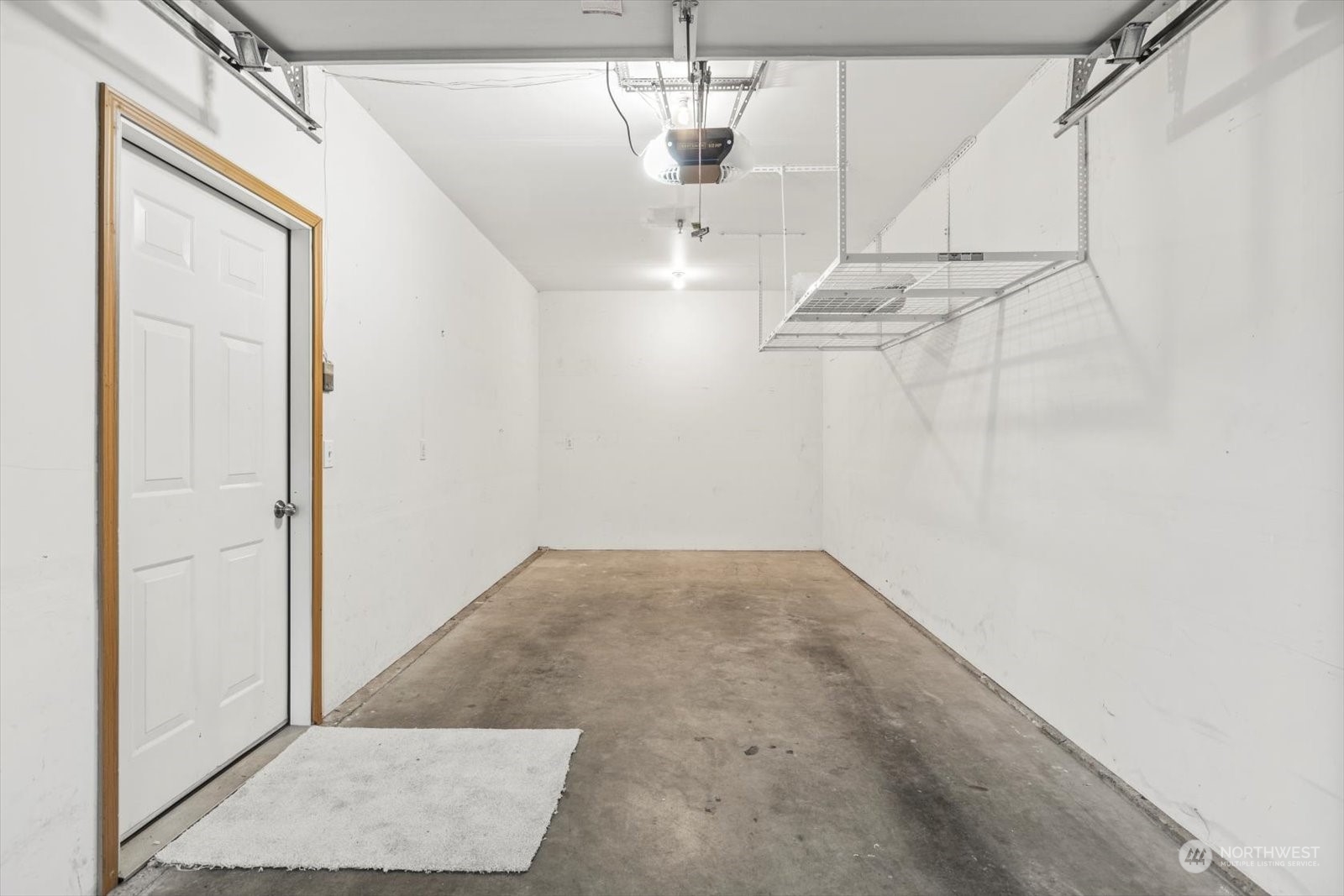 17757 134th Lane Southeast Renton, WA 98058 - Photo 31 of 38 a view of a room with racks on the wall