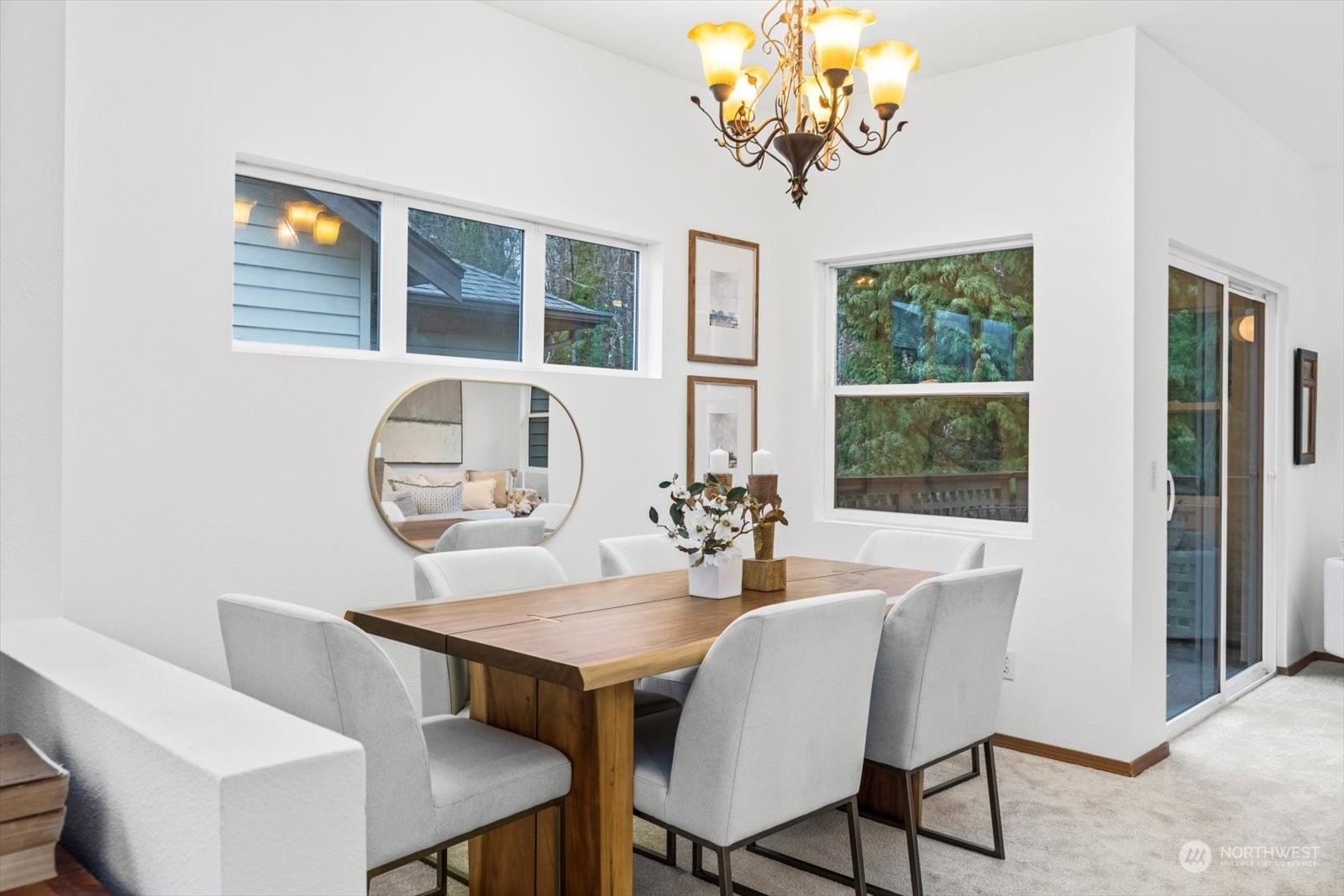 17757 134th Lane Southeast Renton, WA 98058 - Photo 5 of 38 a view of a dining room with furniture and chandelier