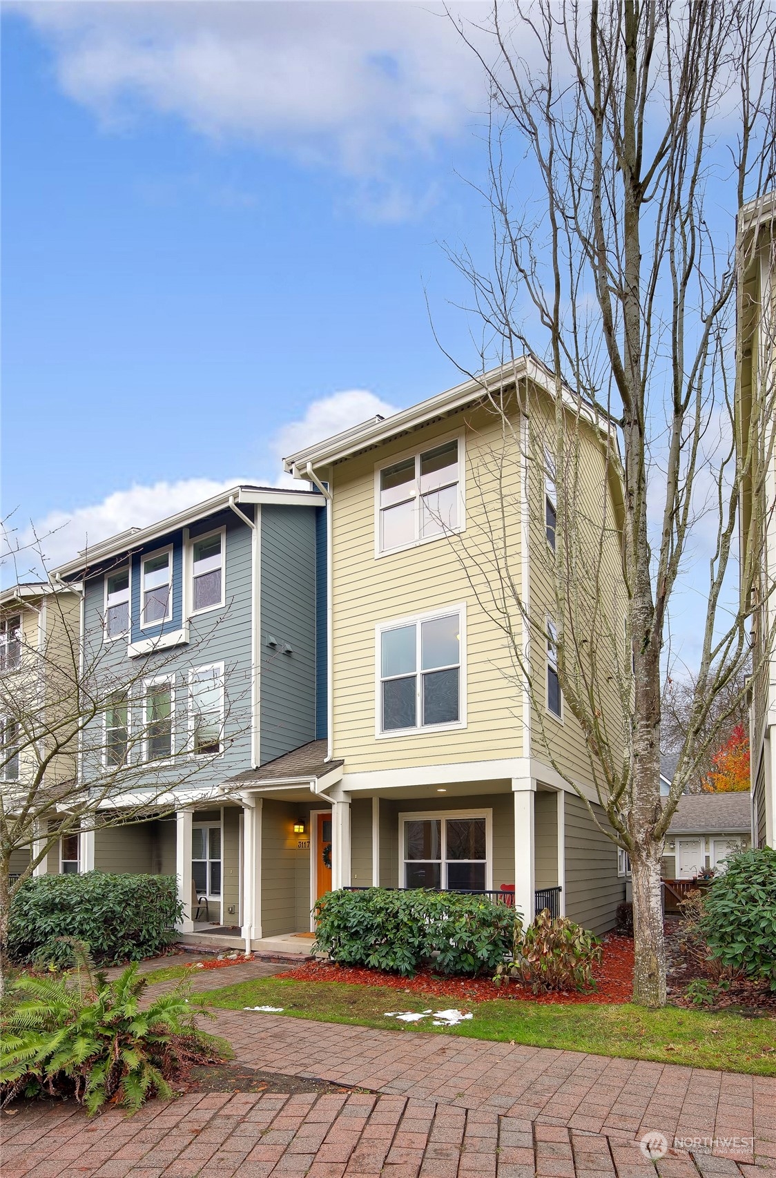 a front view of a house with garden