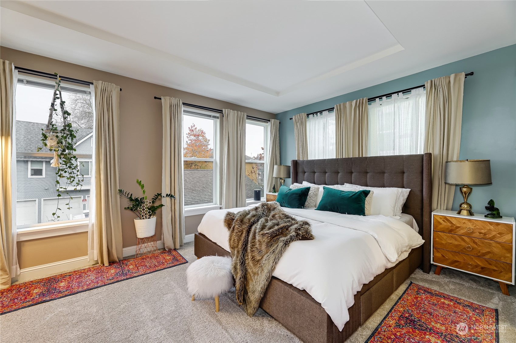 3117 Southwest Raymond Street Seattle, WA 98126 - Photo 11 of 36 a bedroom with a bed and a large window