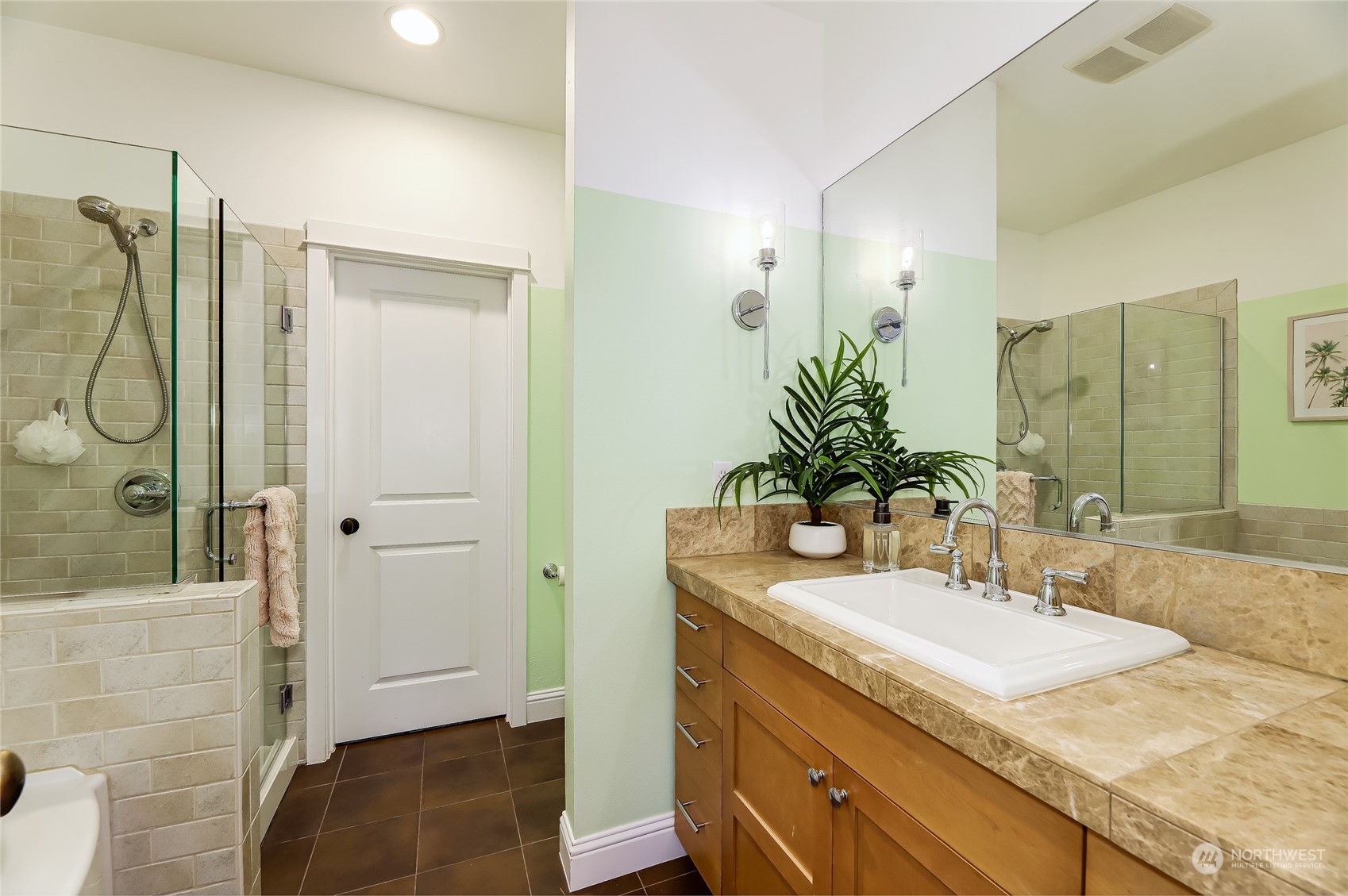 3117 Southwest Raymond Street Seattle, WA 98126 - Photo 14 of 36 a bathroom with a granite countertop sink and a mirror