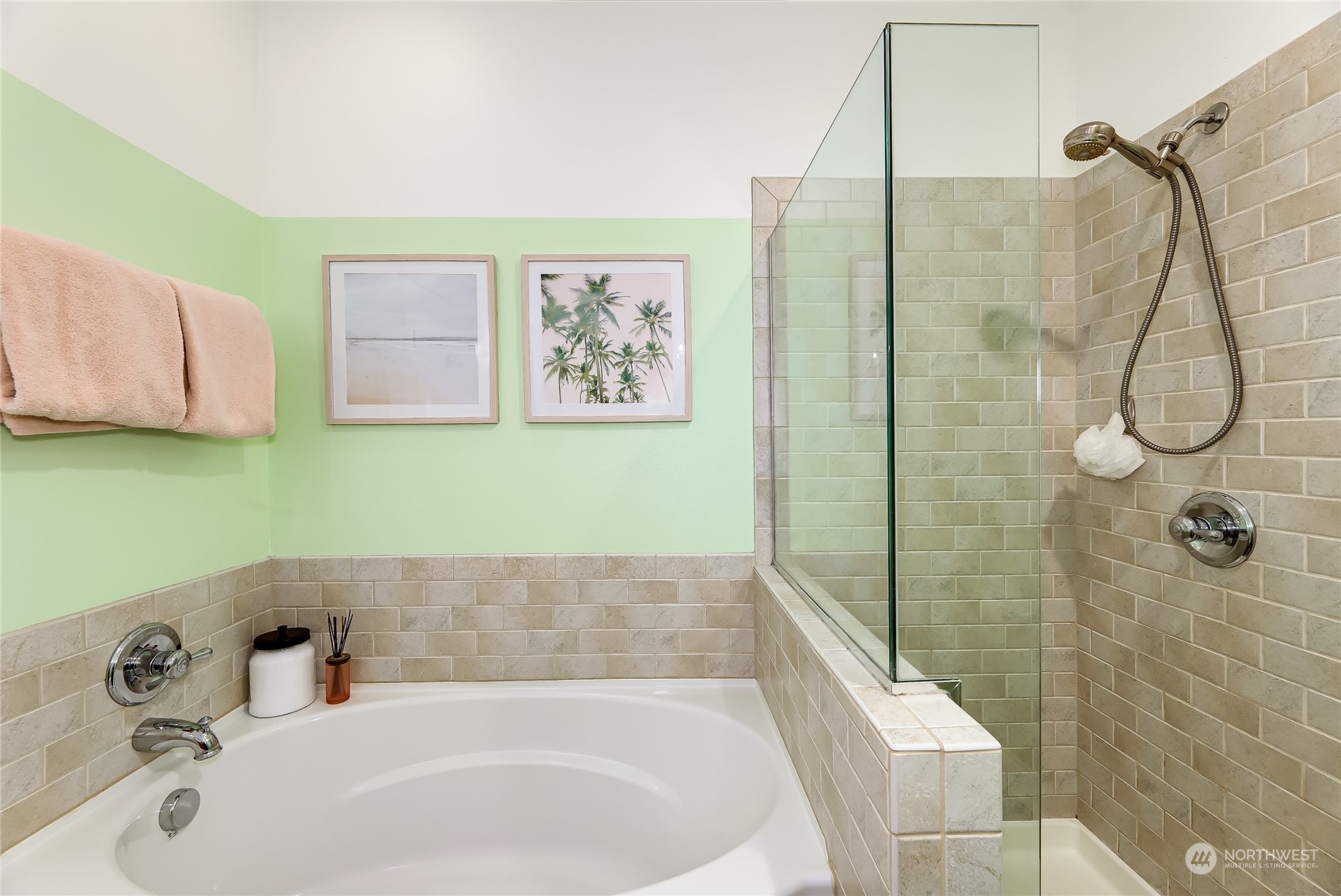 3117 Southwest Raymond Street Seattle, WA 98126 - Photo 15 of 36 a bathroom with a white bath tub and a shower