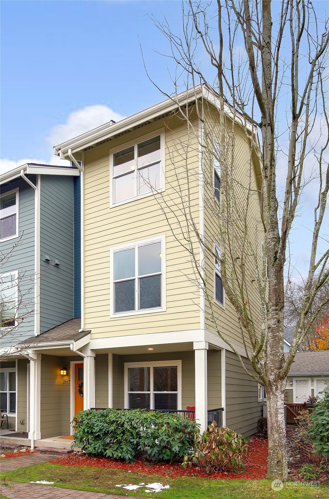 3117 Southwest Raymond Street Seattle, WA 98126 - Photo 29 of 36 a front view of a house with garden