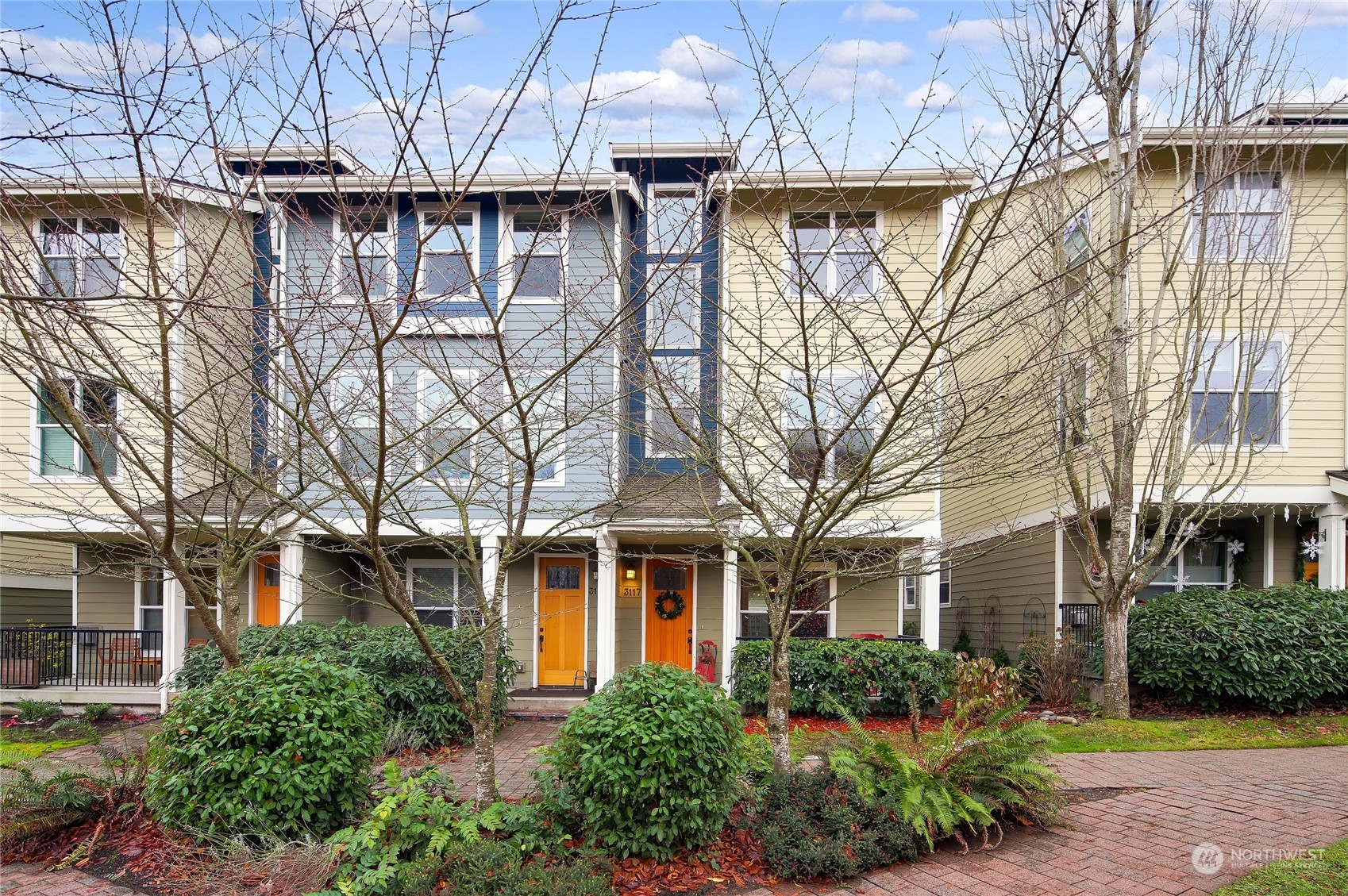 3117 Southwest Raymond Street Seattle, WA 98126 - Photo 31 of 36 a front view of a house with garden