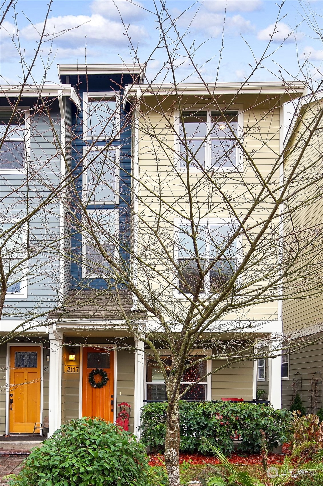 3117 Southwest Raymond Street Seattle, WA 98126 - Photo 32 of 36 front view of a house with a small yard