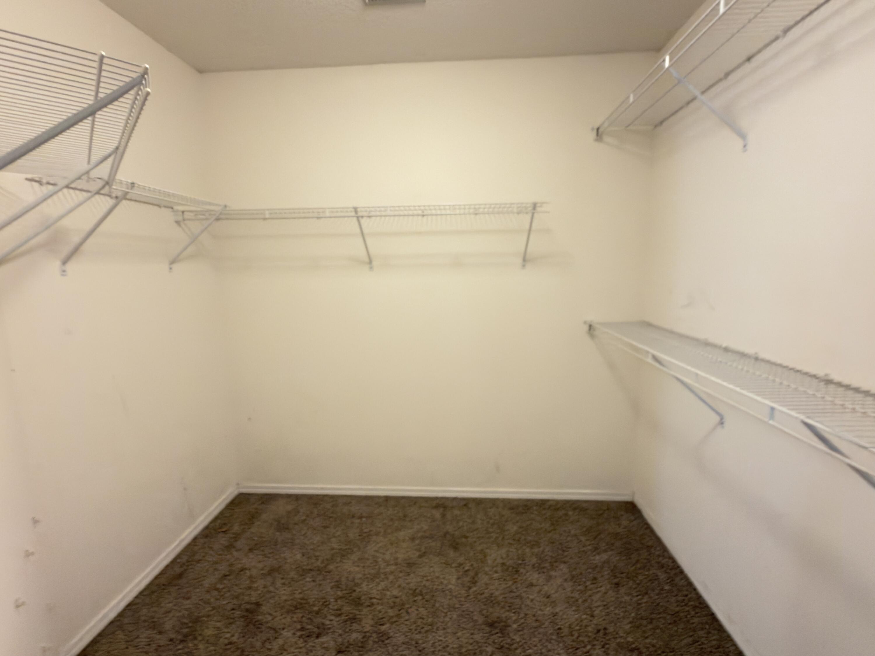 688 Brunson Street Crestview, FL 32536 - Photo 14 of 27 master bed walk in closet